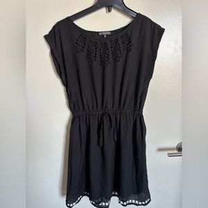 Black Sleeveless Dress with Classic Cutout Detail